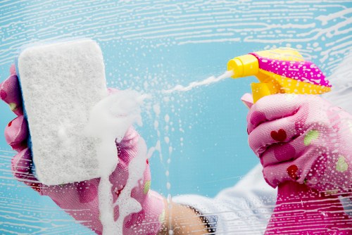 Local domestic cleaner working in a Wandsworth kitchen