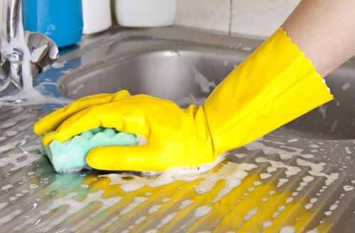 Deep cleaning kitchen surfaces during an end of tenancy clean in Wandsworth